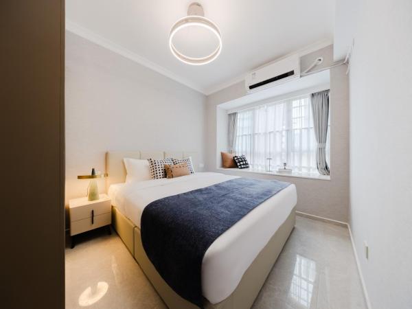 Boruisi Video and Audio Light House - Shenzhen Convention and Exhibition Center Gangxia Metro Station : photo 9 de la chambre suite 3 chambres deluxe