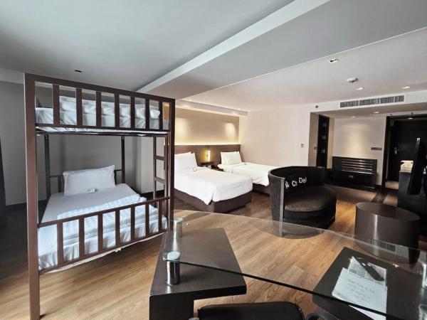 Golden Tulip Mandison Suites : photo 5 de la chambre suite familiale avec lit superposé