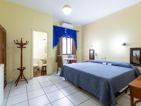 Daher Center Hotel : photo 2 de la chambre chambre lit king-size