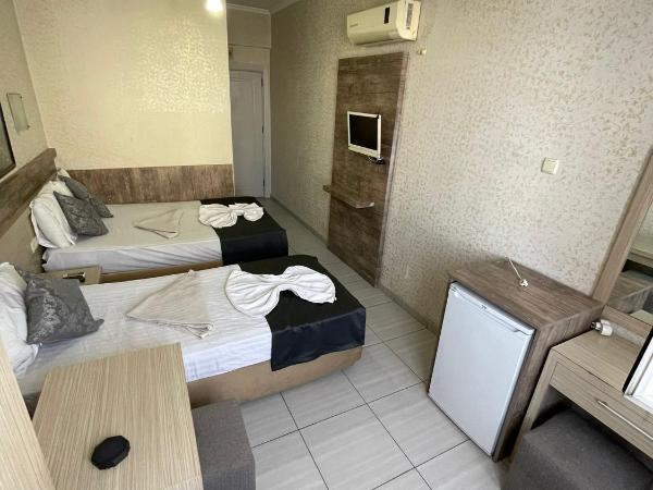 Denizhan Hotel : photo 7 de la chambre grande chambre simple