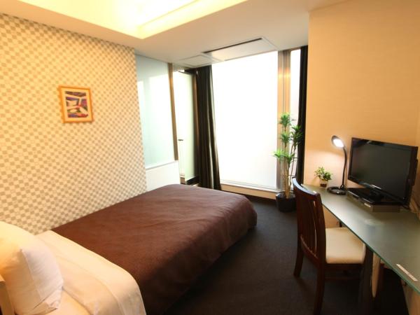 HOTEL LiVEMAX BUDGET Korakuen : photo 7 de la chambre chambre double avec petit lit double - non-fumeurs