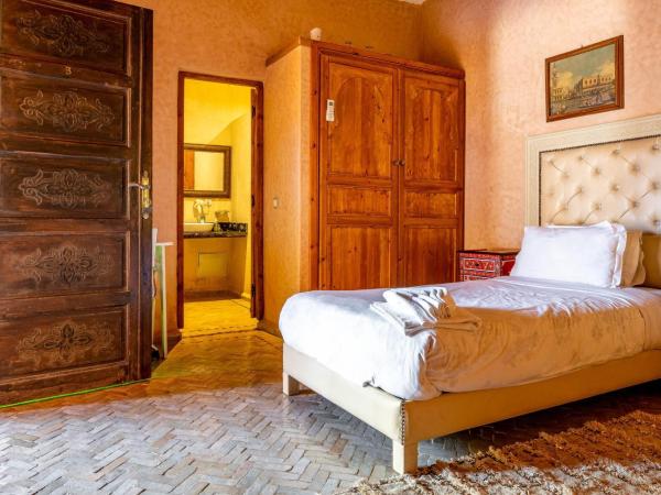 Kasbah Alili : photo 6 de la chambre chambre triple - vue sur la piscine