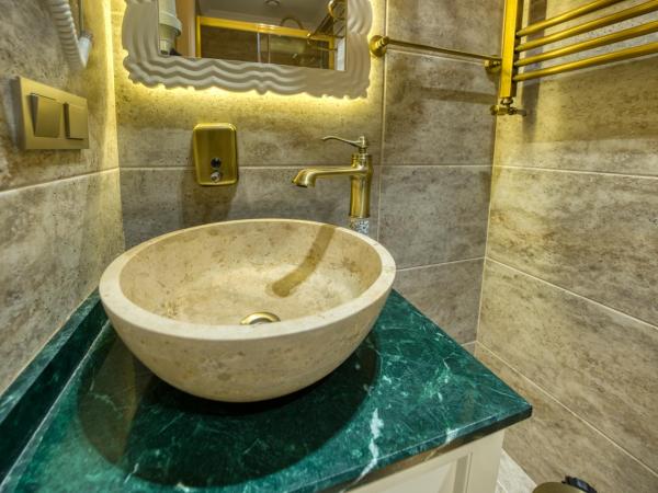 Mahhsen Mansion Oldcity : photo 4 de la chambre chambre triple avec salle de bains privative