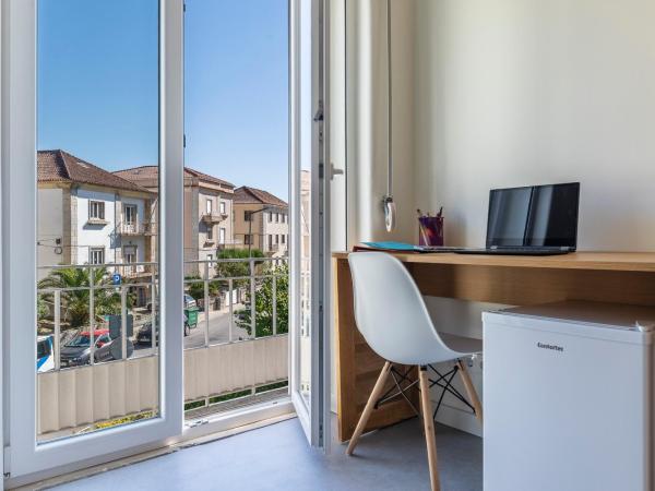 StudentVille Academia : photo 2 de la chambre chambre double deluxe avec balcon