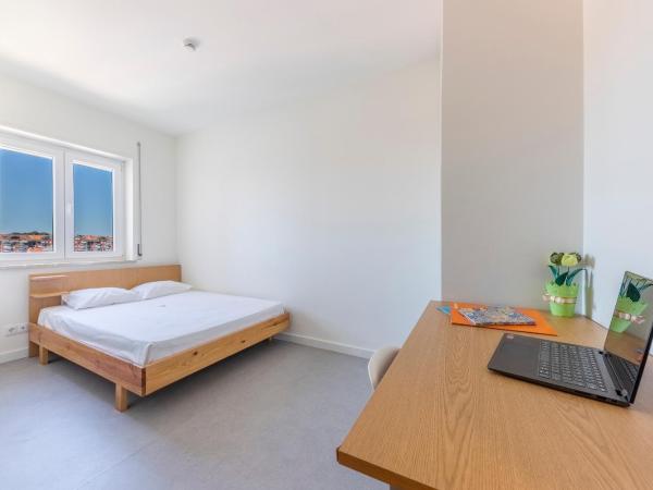 StudentVille Academia : photo 4 de la chambre chambre double avec salle de bains privative