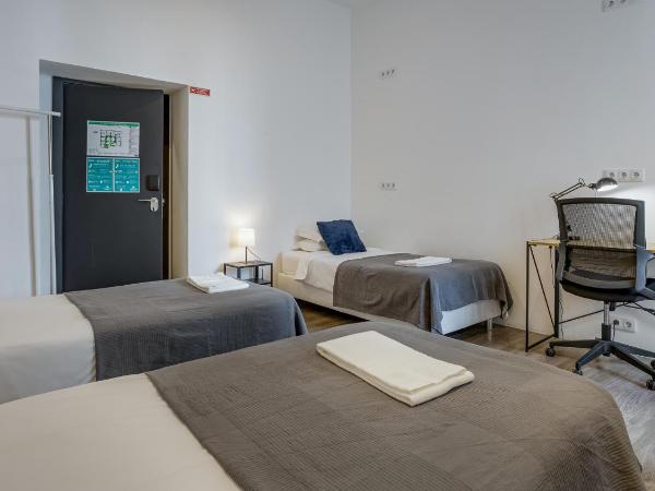 Hostellicious : photo 3 de la chambre chambre triple basique avec salle de bains commune