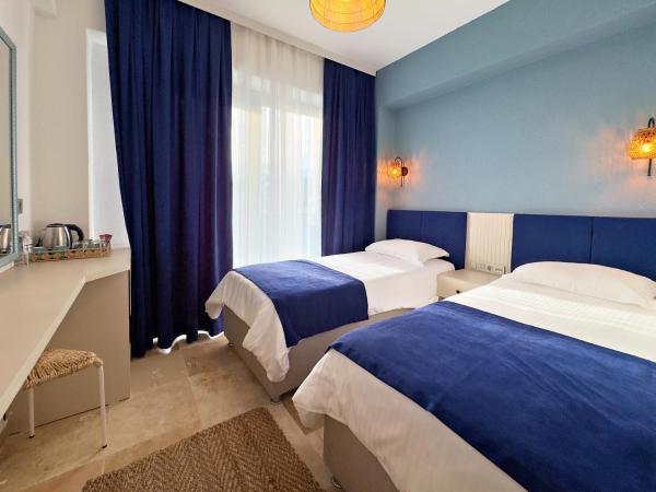 Nese Pension : photo 1 de la chambre chambre lits jumeaux standard - vue sur mer