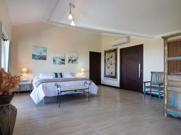 Pousada Ganesha Buzios : photo 1 de la chambre chambre lit king-size - vue sur jardin