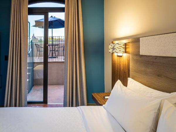 Holiday Inn Express Morelia Centro Historico : photo 4 de la chambre chambre standard lit king-size avec balcon - vue sur ville