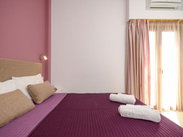 Panormos Hotel and Studios : photo 5 de la chambre chambre familiale deluxe - vue sur mer