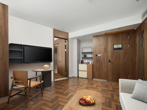 UrCove by Hyatt Tianjin West Railway STN : photo 1 de la chambre suite 1 chambre