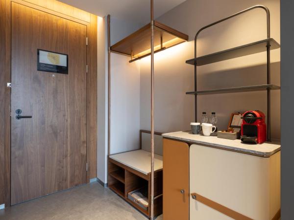 UrCove by Hyatt Tianjin West Railway STN : photo 3 de la chambre chambre lit queen-size