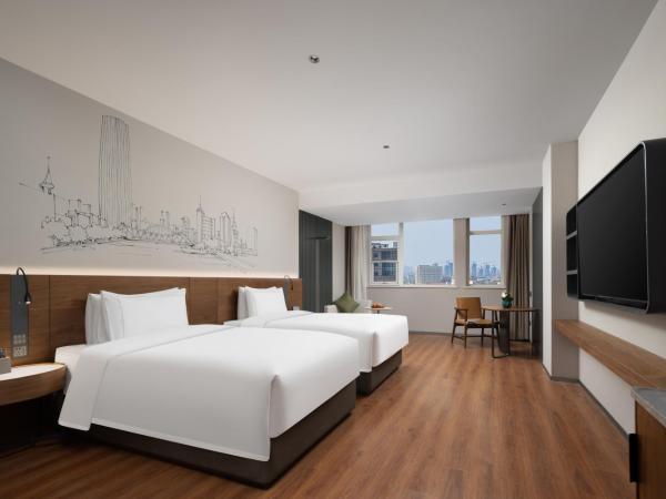 UrCove by Hyatt Tianjin West Railway STN : photo 3 de la chambre chambre lits jumeaux deluxe