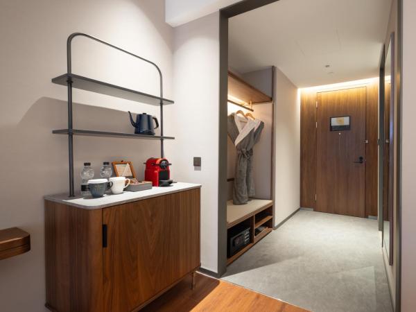 UrCove by Hyatt Tianjin West Railway STN : photo 1 de la chambre chambre lits jumeaux deluxe