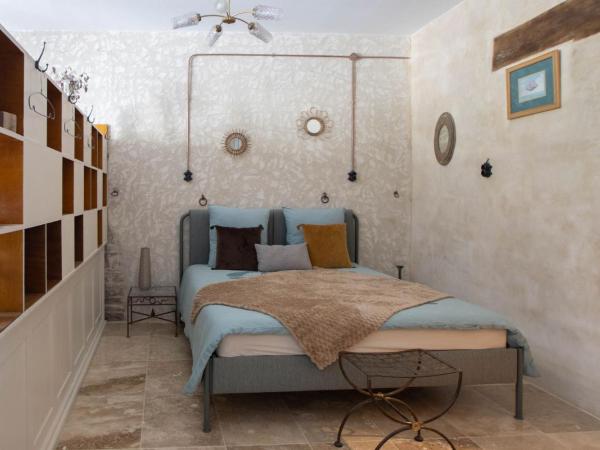 Gîte Les cyprès de l'ile : photo 7 de la chambre appartement avec terrasse