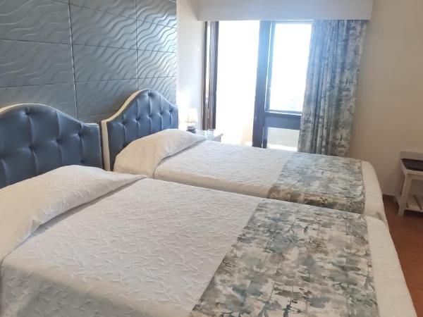 Aeromar Beach Hotel : photo 3 de la chambre chambre lits jumeaux supérieure avec balcon - vue sur mer ou rivière