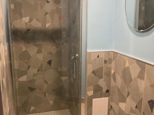 Auberge Alternative : photo 10 de la chambre chambre quadruple avec salle de bains commune