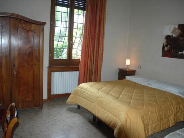 Le Maddalene : photo 2 de la chambre chambre triple avec salle de bains privative