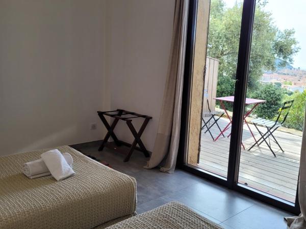 La Bergerie : photo 6 de la chambre chambre lits jumeaux supérieure - vue sur rue et mer