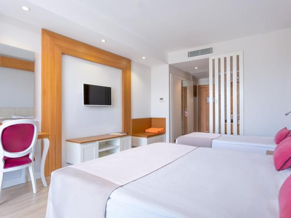 Port Nature Luxury Resort : photo 2 de la chambre chambre triple