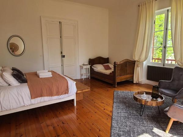 Le Manoir du Moulin de Madame : photo 9 de la chambre suite deluxe avec baignoire spa