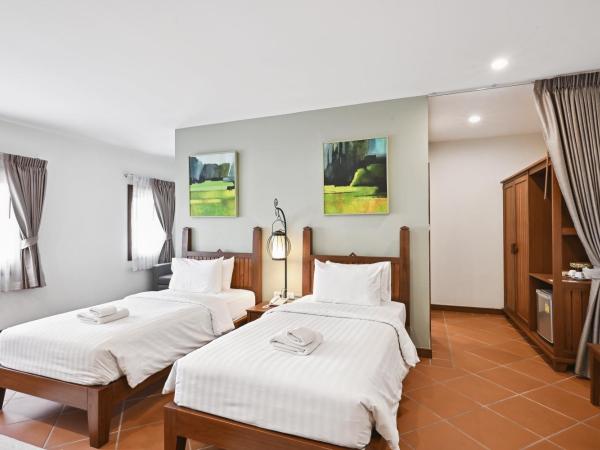 Villa Sanpakoi : photo 3 de la chambre chambre lits jumeaux - vue sur ville