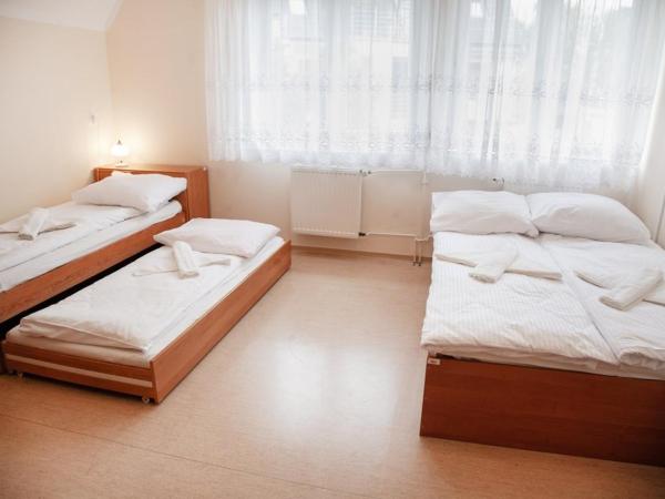 Dom Pracy Twórczej Politechniki Morskiej w Szczecinie : photo 8 de la chambre chambre quadruple premium