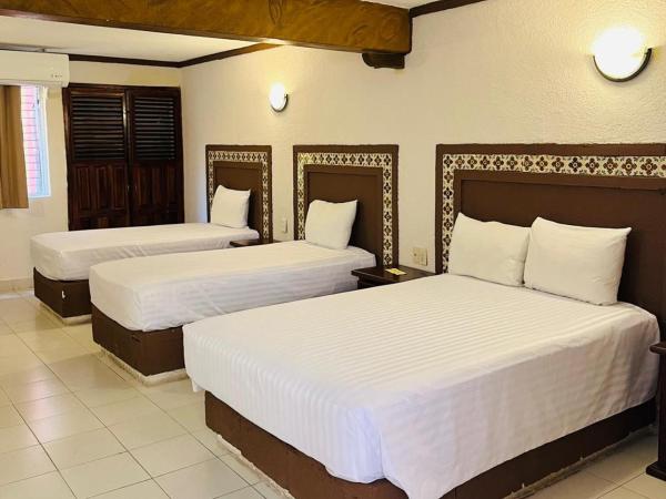 Suites Cancun Center : photo 1 de la chambre chambre triple