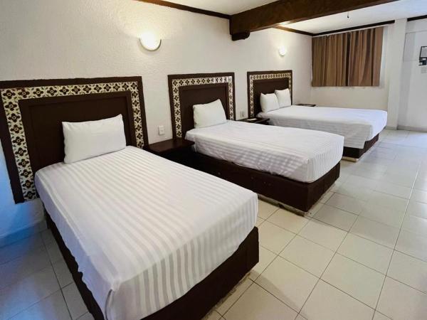 Suites Cancun Center : photo 3 de la chambre chambre triple