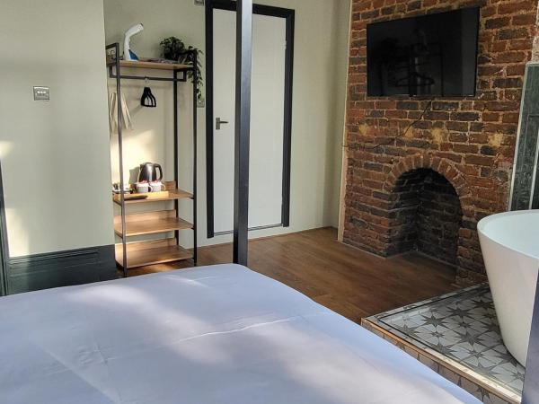 INNit Bliss : photo 4 de la chambre chambre double deluxe avec baignoire