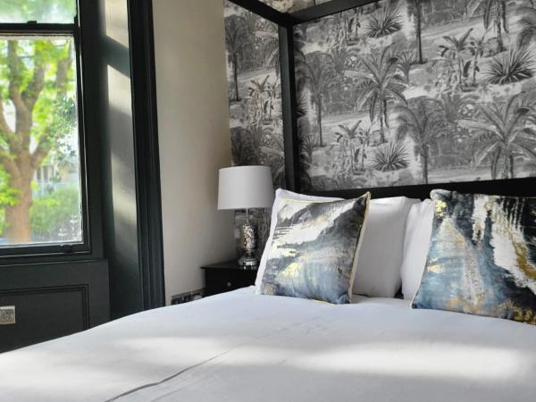 INNit Bliss : photo 10 de la chambre chambre double deluxe avec baignoire