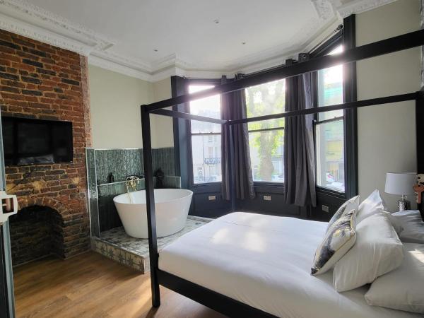 INNit Bliss : photo 7 de la chambre chambre double deluxe avec baignoire