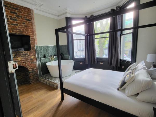 INNit Bliss : photo 9 de la chambre chambre double deluxe avec baignoire