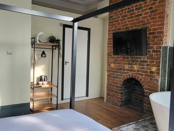 INNit Bliss : photo 6 de la chambre chambre double deluxe avec baignoire