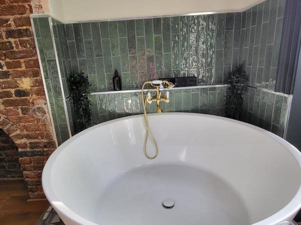 INNit Bliss : photo 3 de la chambre chambre double deluxe avec baignoire