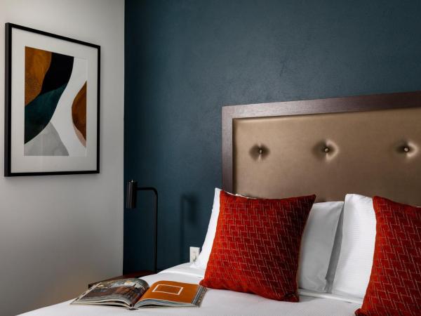 Rydges Auckland : photo 1 de la chambre chambre lit king-size supérieure