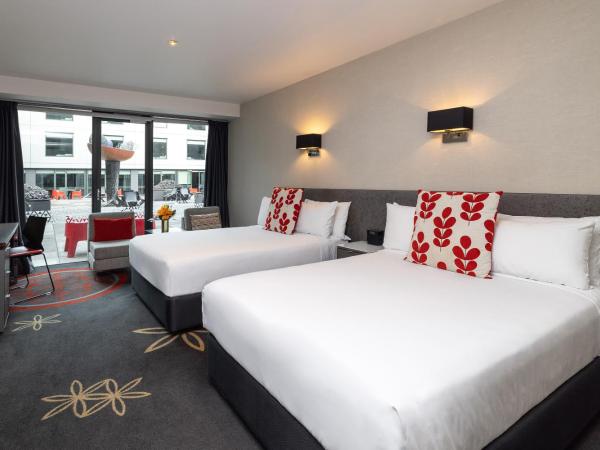 SkyCity Hotel Auckland : photo 1 de la chambre chambre lits jumeaux premium avec cour