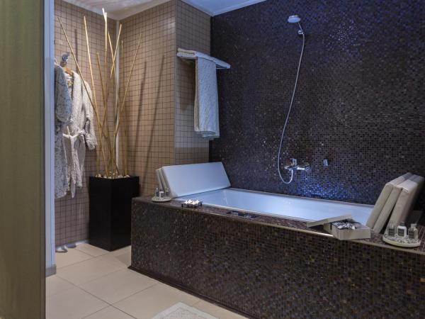 Business Hotel : photo 5 de la chambre suite deluxe avec baignoire spa
