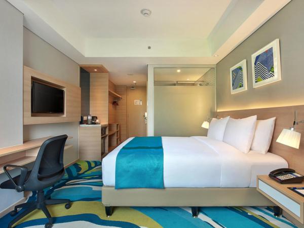 Holiday Inn Express Jakarta Wahid Hasyim, an IHG Hotel : photo 3 de la chambre chambre lit queen-size standard - vue sur ville