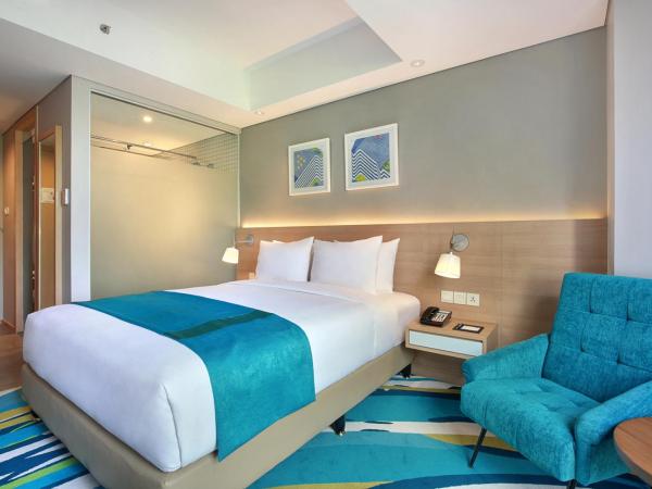 Holiday Inn Express Jakarta Wahid Hasyim, an IHG Hotel : photo 1 de la chambre chambre lit queen-size standard - vue sur ville