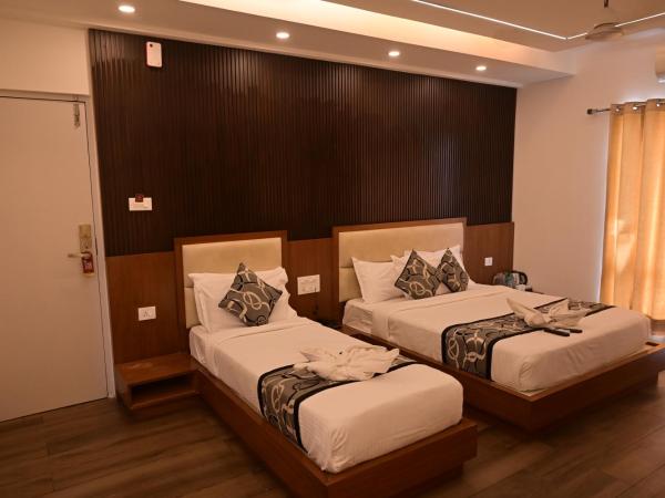 Grand Cascade Chennai : photo 3 de la chambre chambre lit king-size