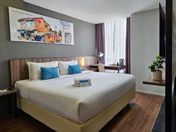 Days Hotel & Suites by Wyndham Fraser Business Park KL : photo 1 de la chambre chambre lit king-size deluxe - non-fumeurs