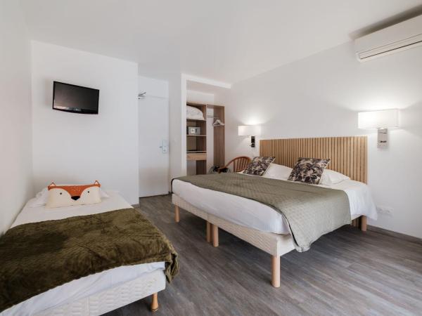 Anglade Hotel : photo 1 de la chambre chambre triple - côté village