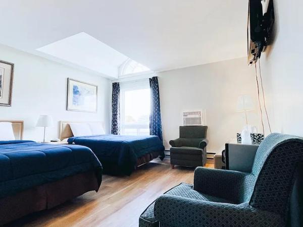 Commons Inn : photo 1 de la chambre chambre de luxe avec 2 lits doubles