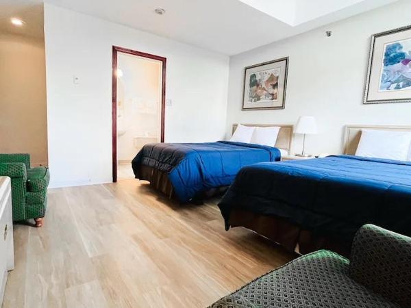 Commons Inn : photo 2 de la chambre chambre de luxe avec 2 lits doubles