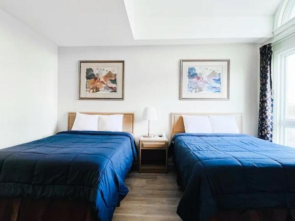 Commons Inn : photo 4 de la chambre chambre de luxe avec 2 lits doubles