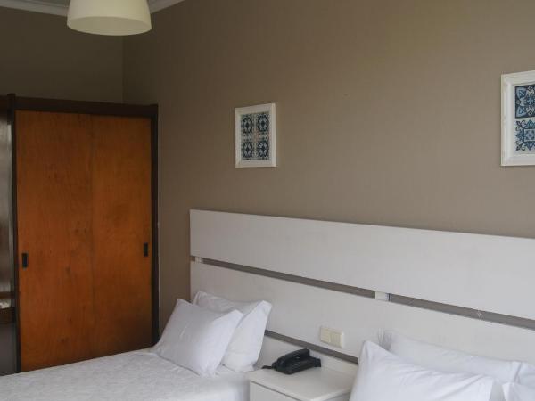 Hotel Chique Aliados : photo 1 de la chambre chambre triple