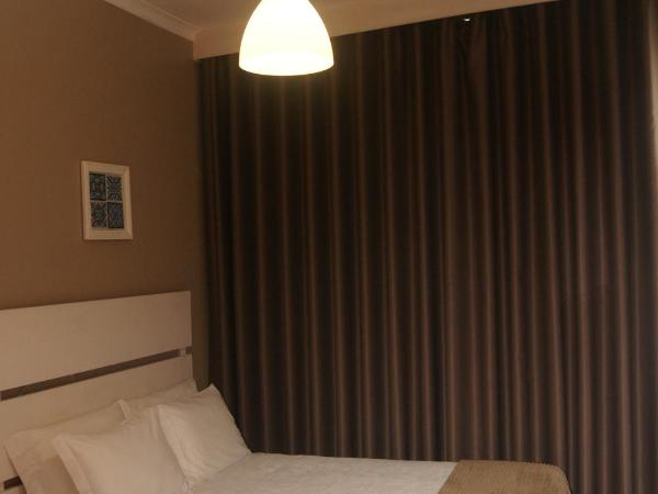 Hotel Chique Aliados : photo 8 de la chambre chambre triple