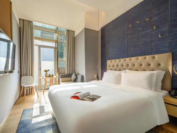 Lux Cabins Hotel Shenzhen : photo 1 de la chambre chambre lit king-size supérieure