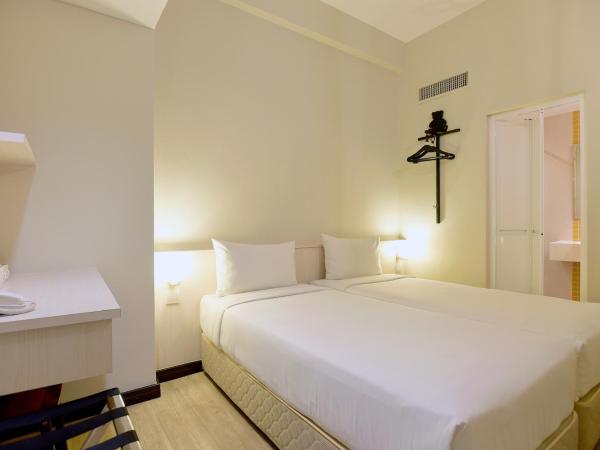 Cititel Express Kota Kinabalu : photo 3 de la chambre chambre lits jumeaux standard - sans fenêtre